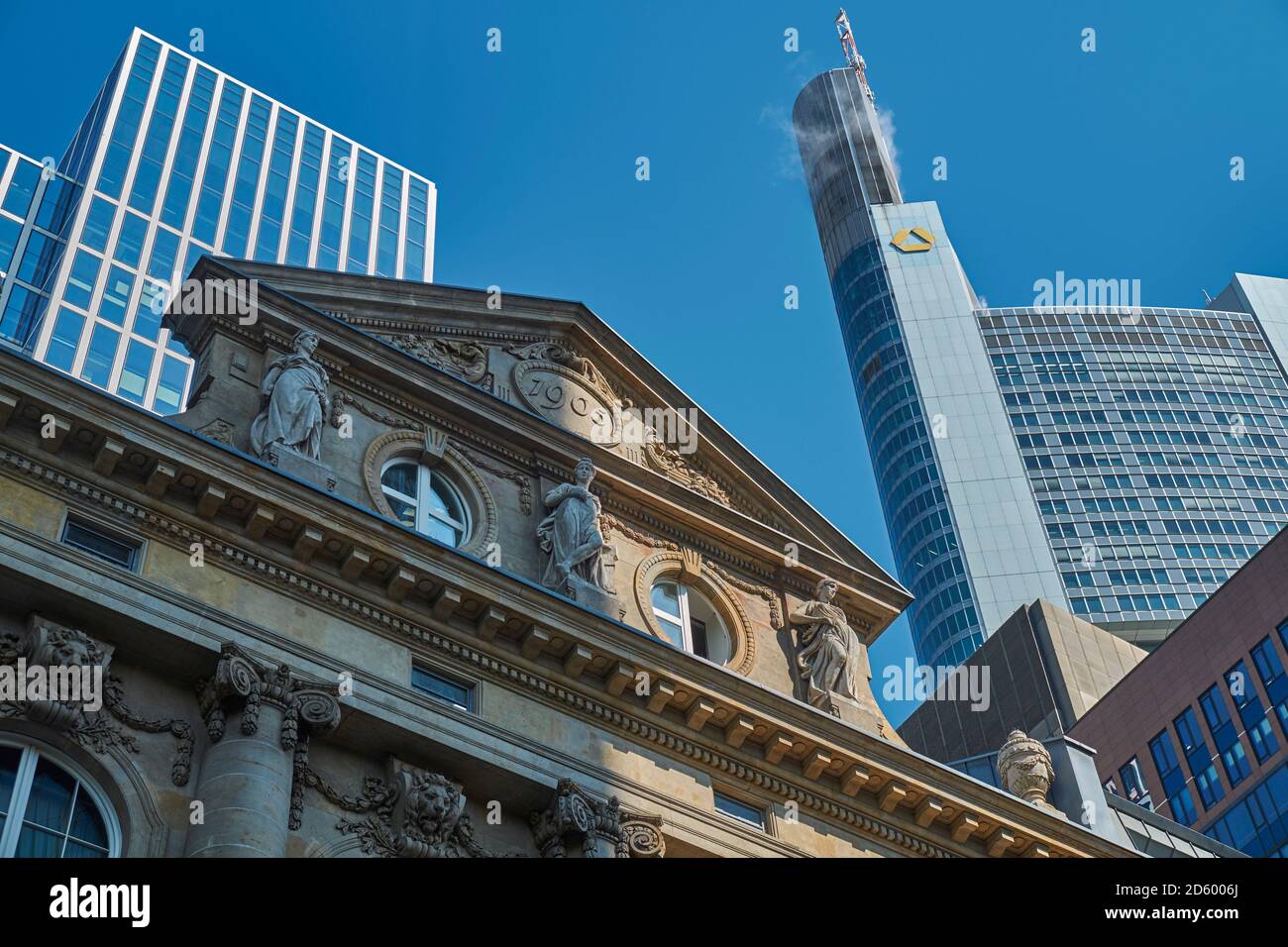 Germany, Hesse, Frankfurt, Facade of an old building and modern bank building Stock Photo