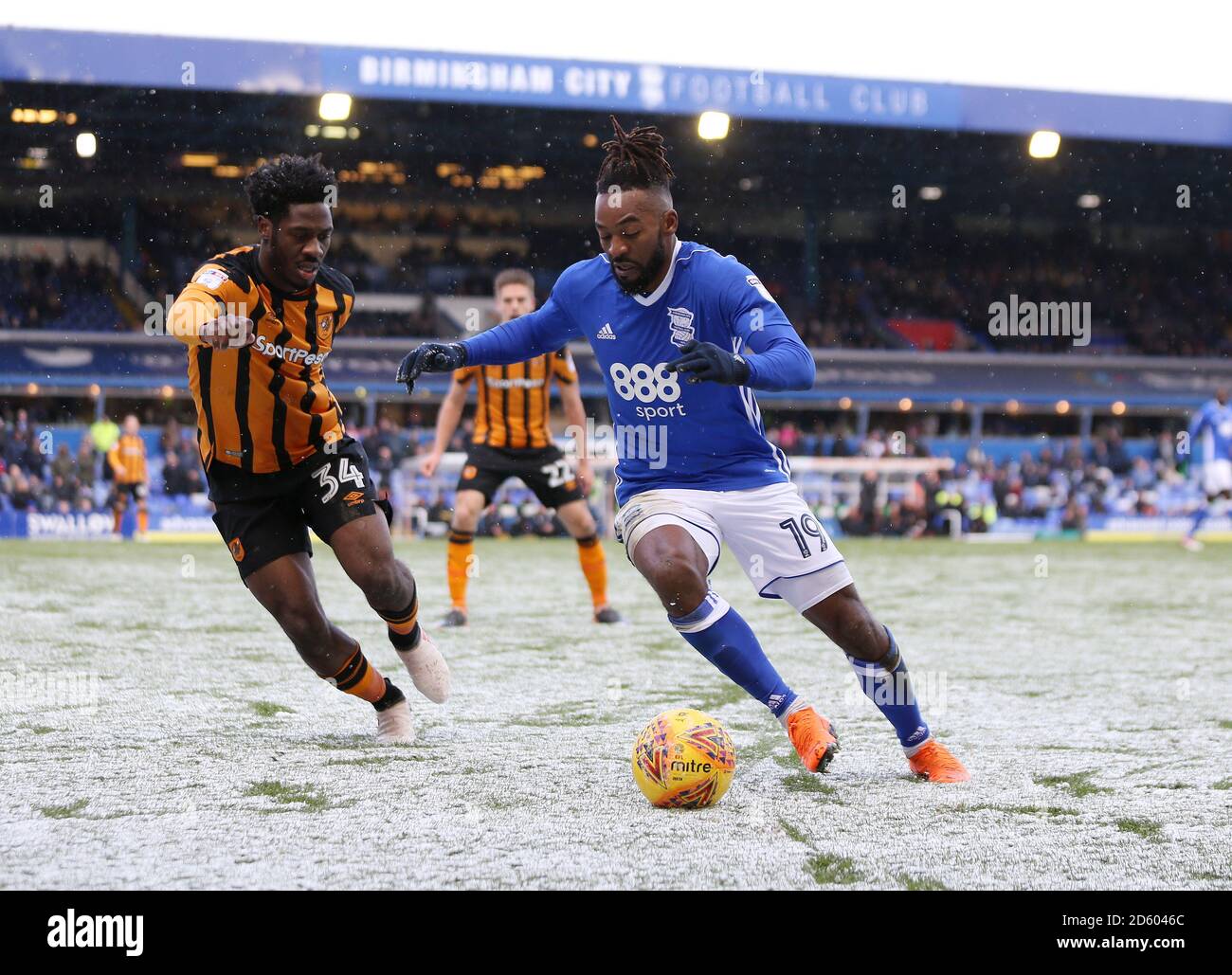 Birmingham City's Jacques Maghoma and Hull City's Ola Aina battle for the ball during the match at St Andrew's Stadium  Stock Photo