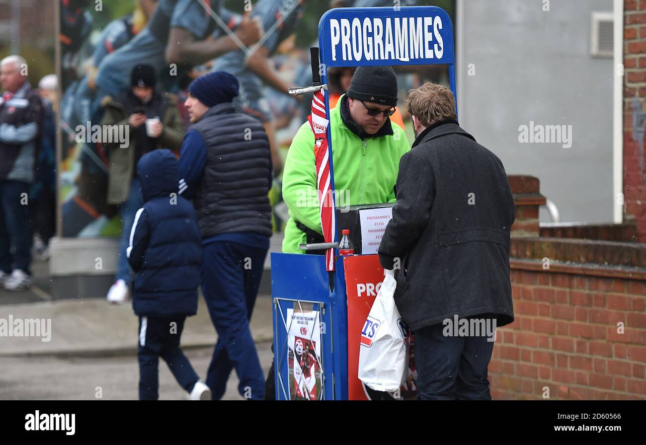 Programme Seller Programme seller outside The Valley Stadium Stock Photo - Alamy