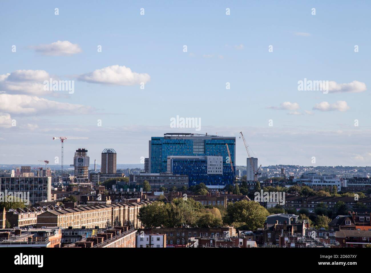 The Royal London Hospital,London,England,UK with a helicopter above it Stock Photo
