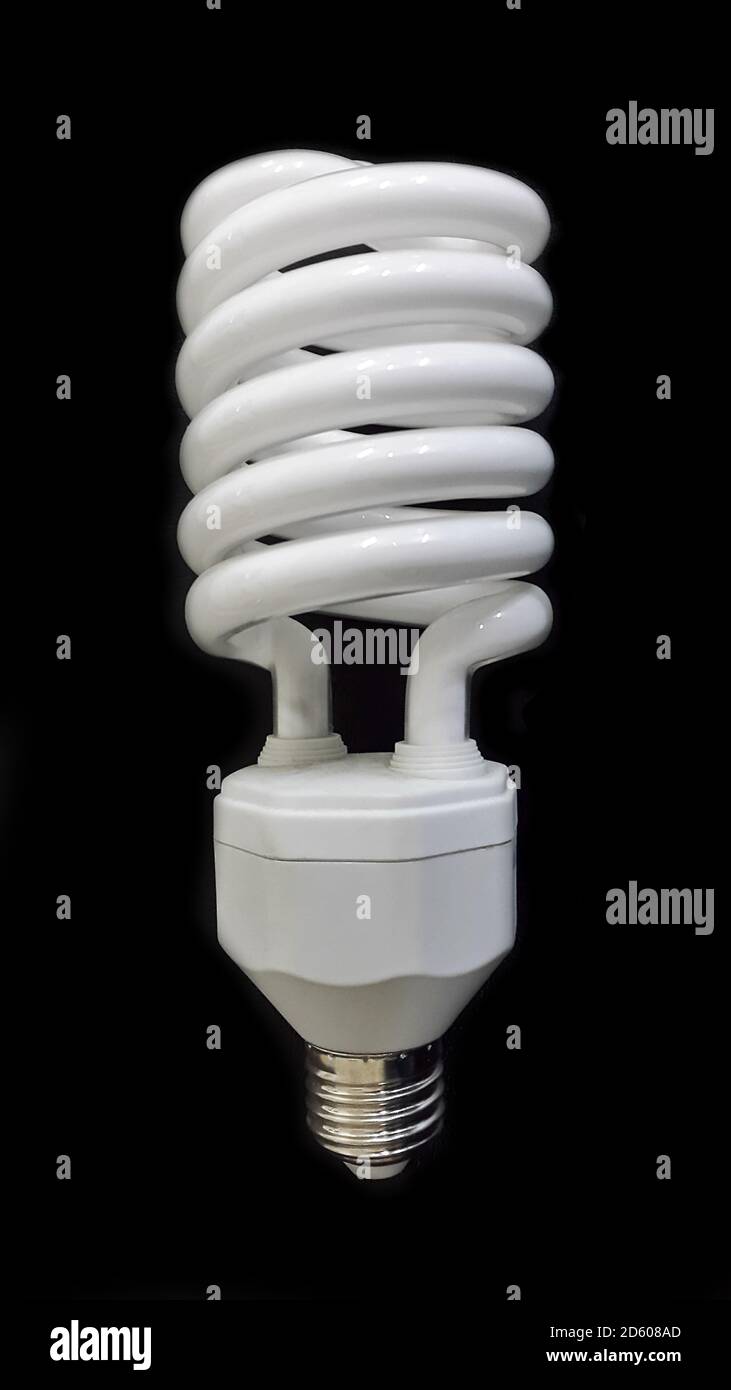 Lamp. Powersave lamp. White light bulb on black background Stock Photo