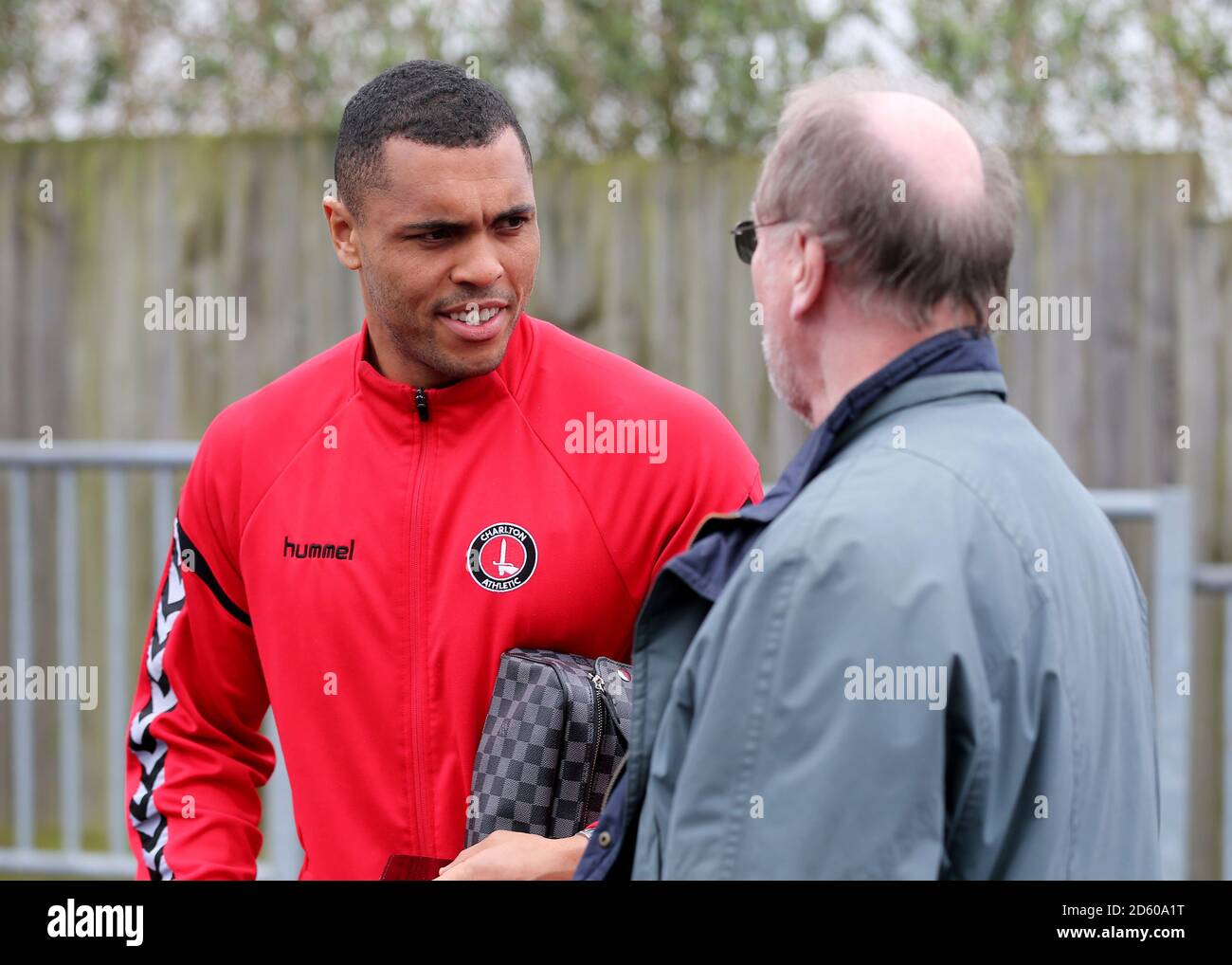 Charlton Athletic's Josh Magennis (left) chats to a fan as he arrives