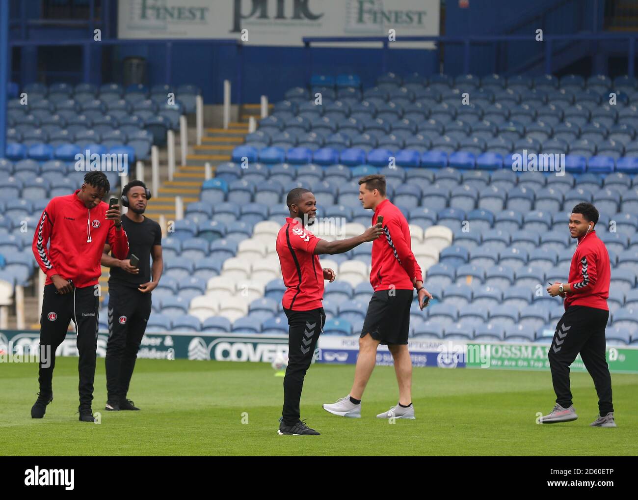 The Charlton Athletic players inspect the Fratton Park pitch before kick off Stock Photo