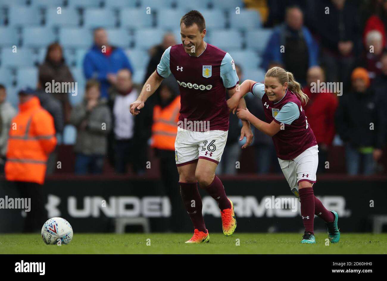 Aston Villa's John Terry plays football with his daughter Summer Rose Terry after the game against Derby County  Stock Photo