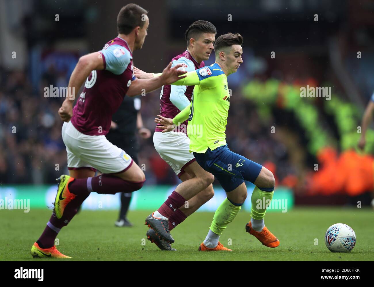 Derby County's Tom Lawrence holds off challenges from Aston Villa's John Terry and Aston Villa's Jack Grealish  Stock Photo