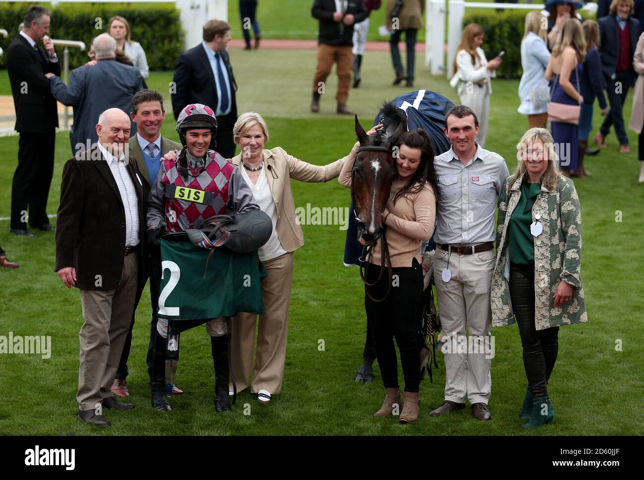 Barel Of Laughs ridden by jockey Alex Edwards with the owners and ...
