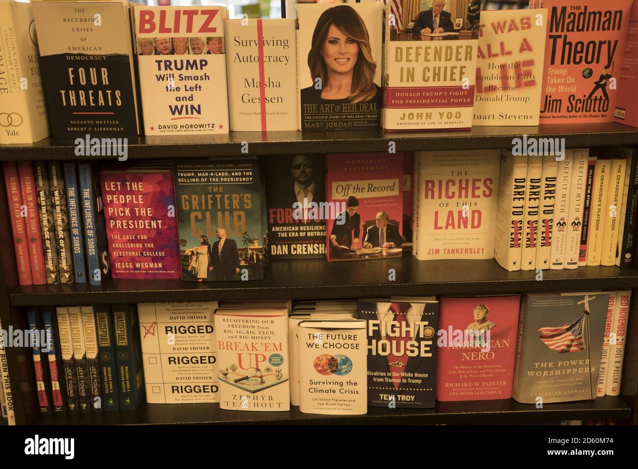 Writng books about President Donald Trump, his administration and family is a lucrative cottage industry as can be seen by shelves at a bookstore in New York City. Stock Photo
