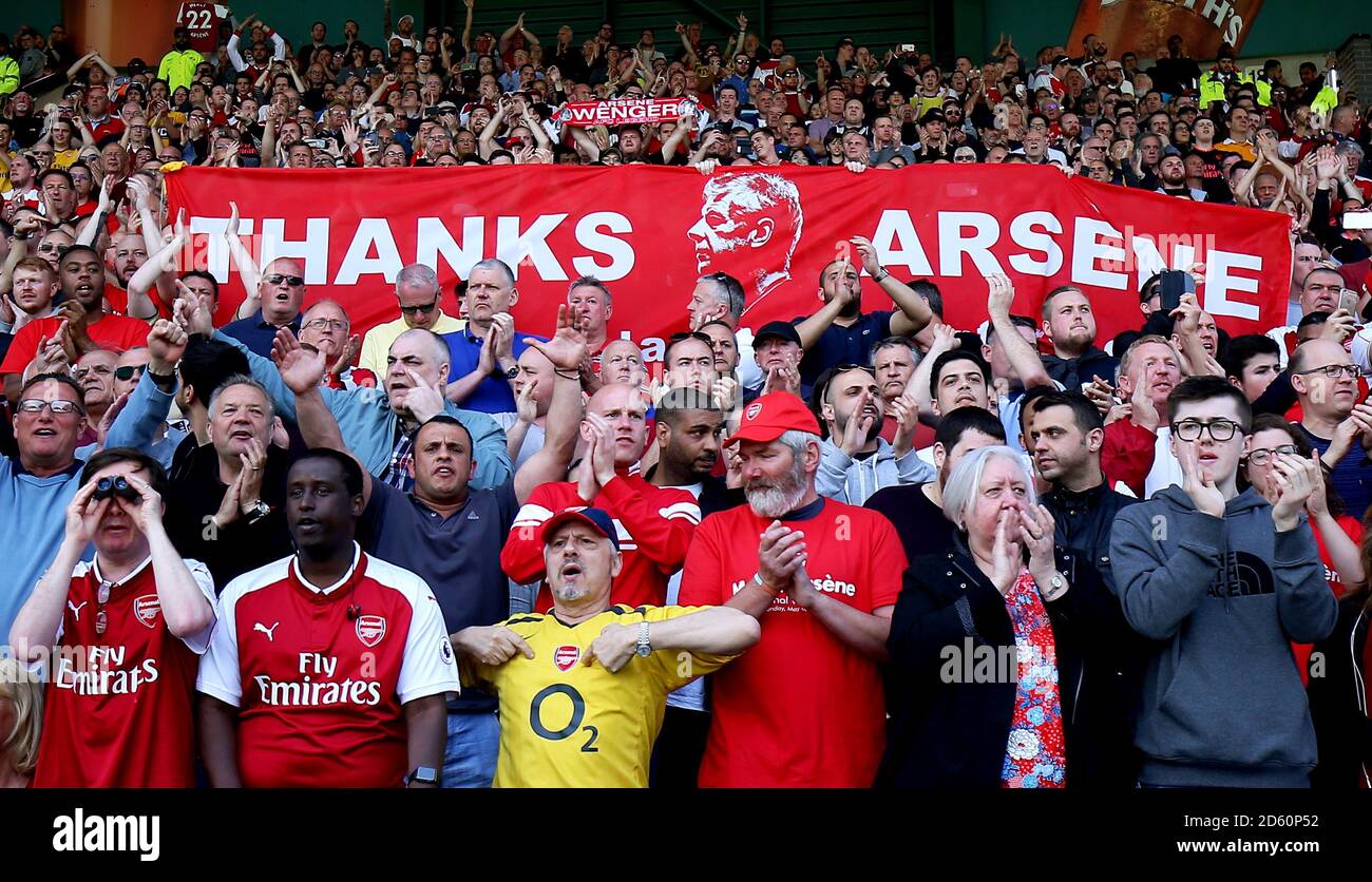 Arsenal fans in the stands hold up a banner honouring outgoing manager Arsene  Wenger Stock Photo - Alamy
