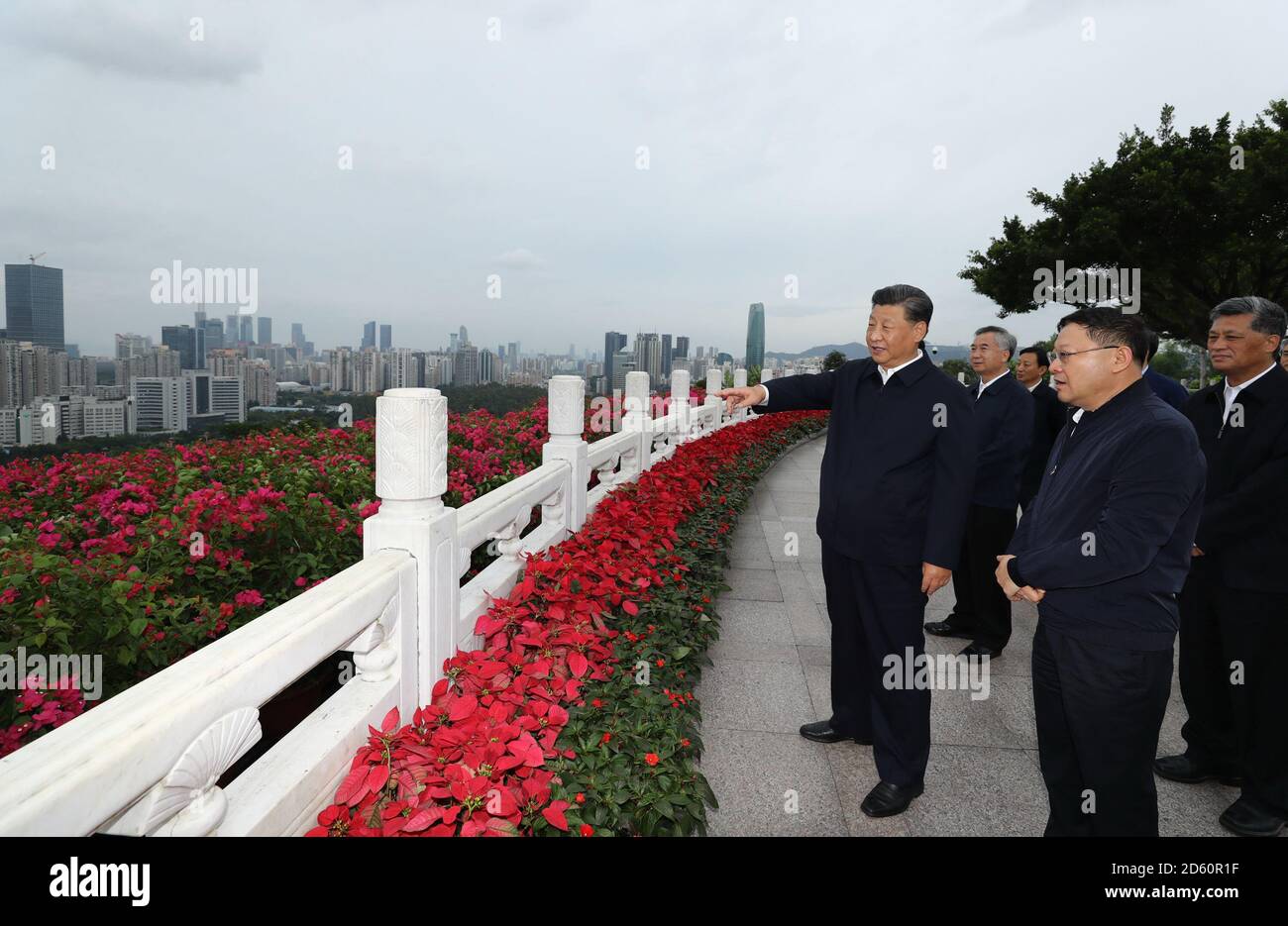 Shenzhen, China's Guangdong Province. 14th Oct, 2020. Chinese President Xi Jinping, also general secretary of the Communist Party of China Central Committee and chairman of the Central Military Commission, views the city from Lianhuashan Park in Shenzhen, south China's Guangdong Province, Oct. 14, 2020. Xi attended a grand gathering held to celebrate the 40th anniversary of the establishment of the Shenzhen Special Economic Zone and delivered an important speech on Wednesday. Credit: Ju Peng/Xinhua/Alamy Live News Stock Photo