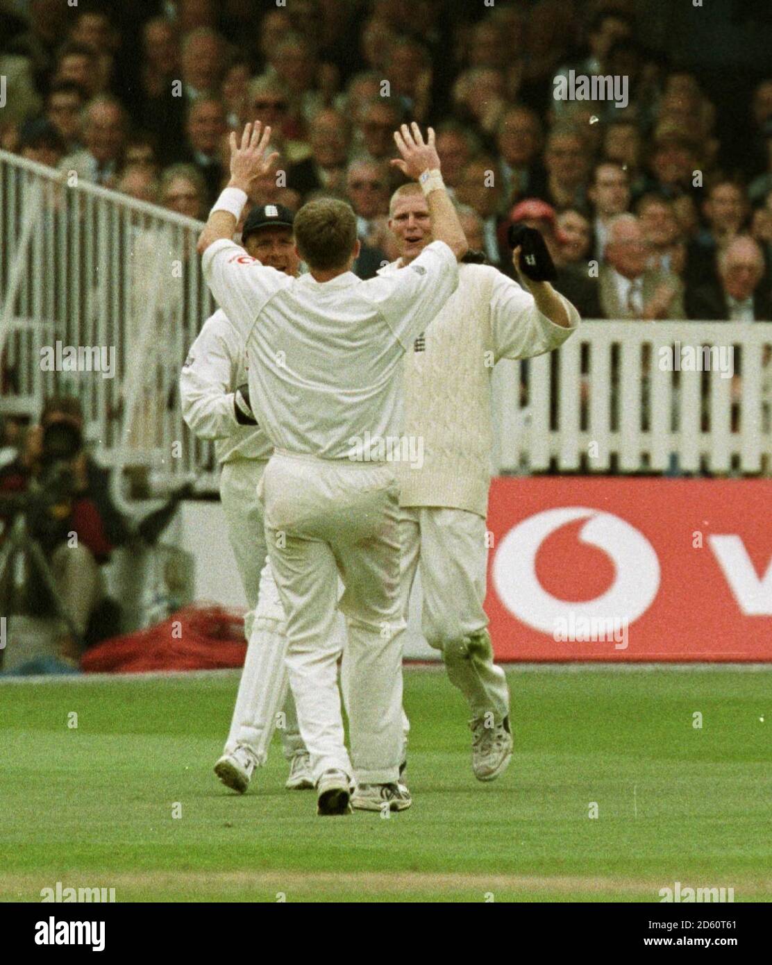 England's Matthew Hoggard (r) celebrates with bowler Dominic Cork (l) after catching West Indies' Sherwin Campbell out  Stock Photo