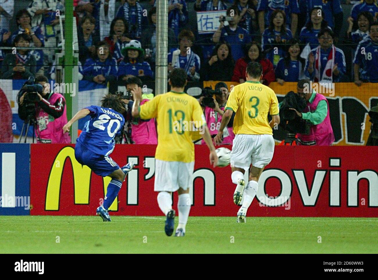 Japan's Keiji Tamada (l) scores the opening goal against Brazil Stock Photo