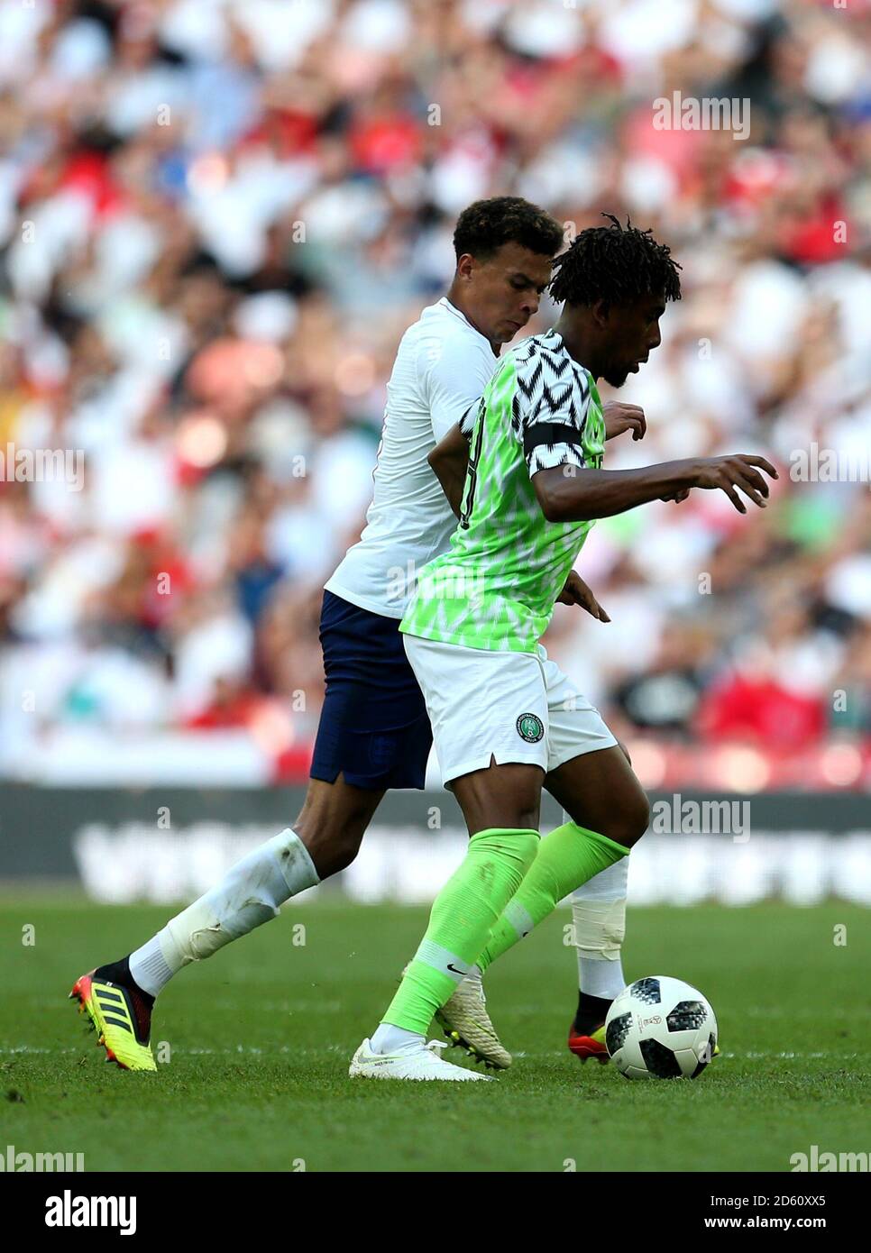 Nigeria's Alex Iwobi and England's Dele Alli in action Stock Photo Alamy