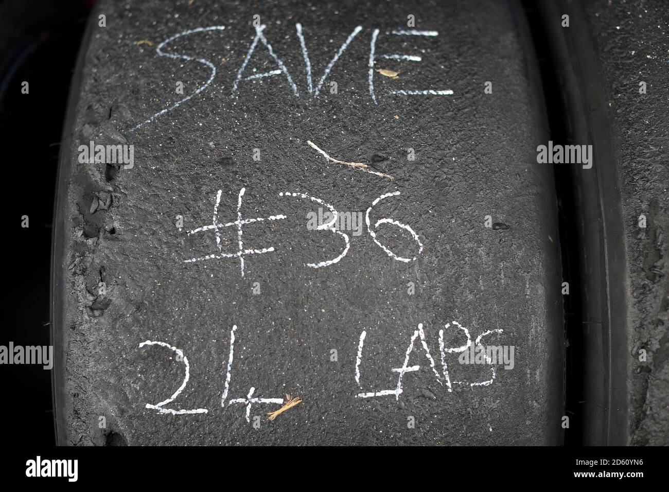 Chalk marked used tyres Stock Photo Alamy