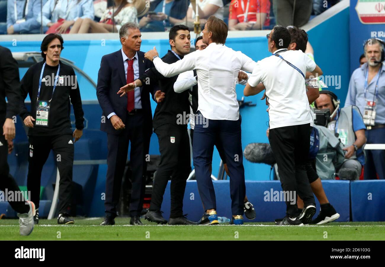 Tempers Flare Between Iran Manager Carlos Queiroz Second Left And Morocco Manager Herve Renard Stock Photo Alamy