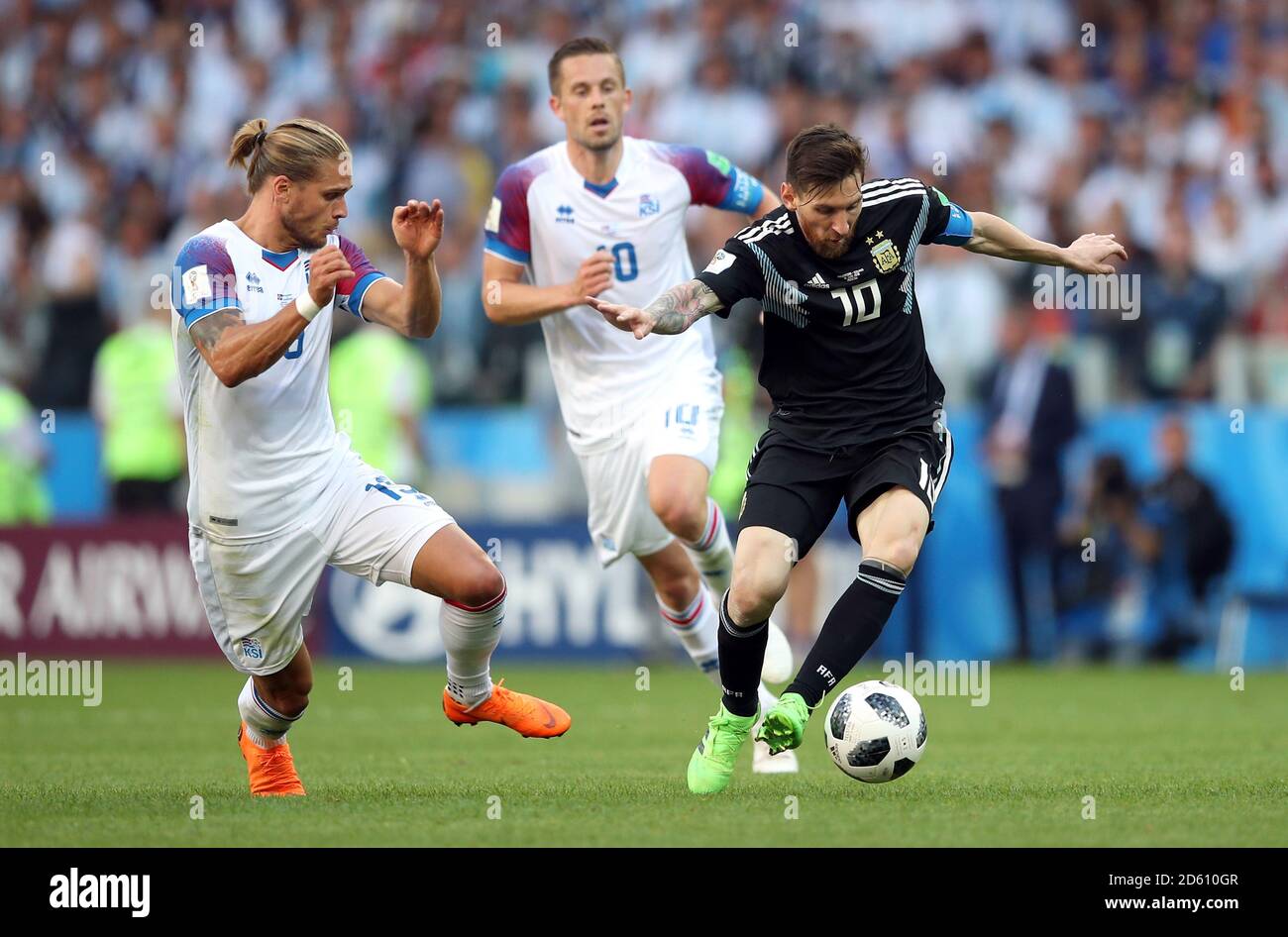 Argentina's Lionel Messi (right) and Iceland's Rurik Gislason (left) Stock Photo