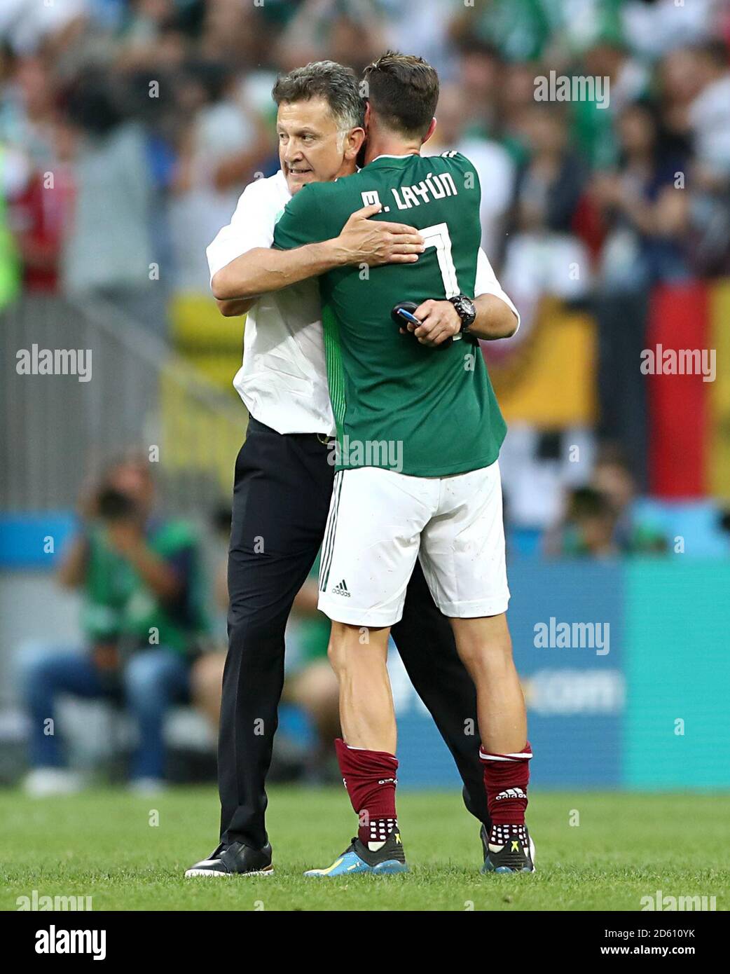Mexico's Miguel Layun (right) embraces Mexico Manager Juan Carlos Osorio after the final whistle Stock Photo