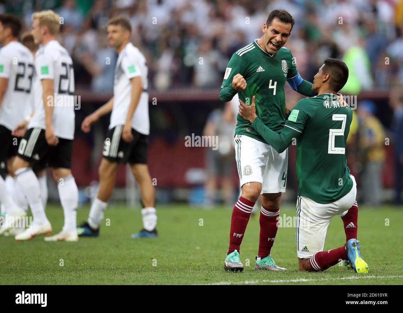 Mexico's Rafael Marquez (second right) and Hugo Ayala (left) celebrates after the final whistle Stock Photo