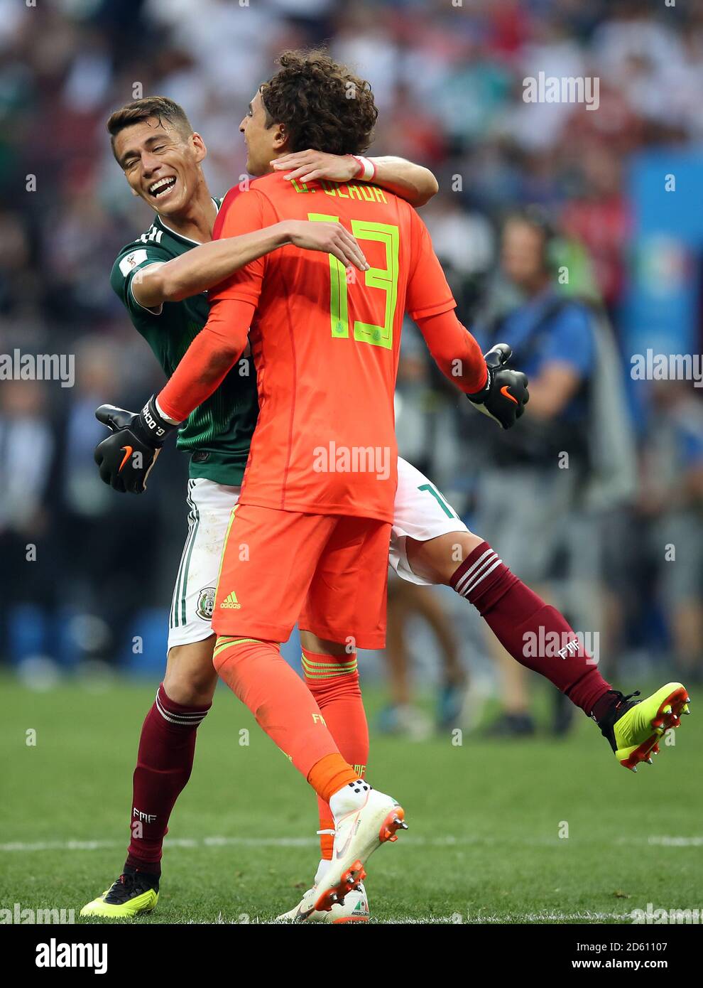 Mexico's Hector Moreno (behind) celebrates with team-mate Guillermo Ochoa after the final whistle Stock Photo