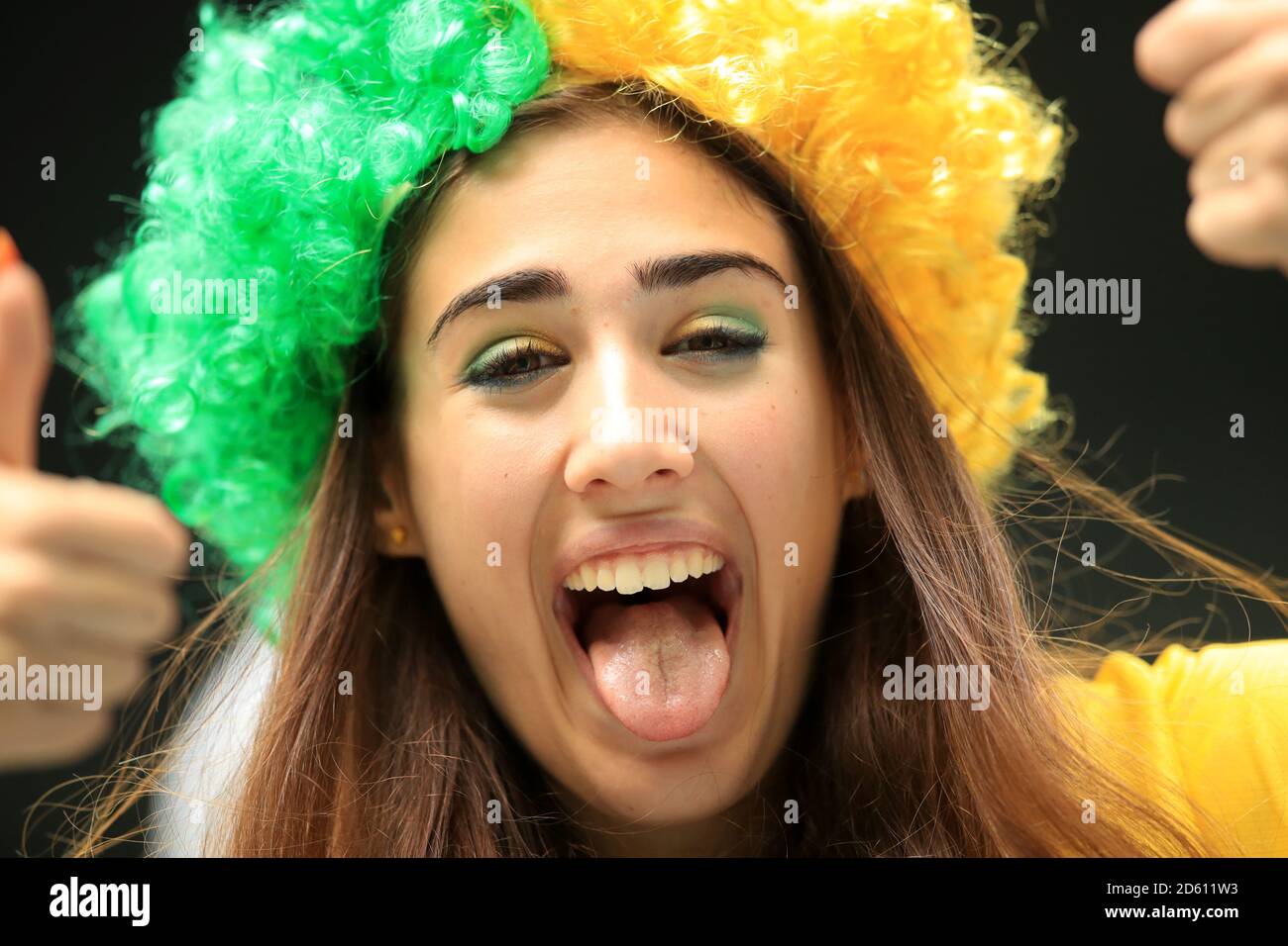 A Brazil fans shows her support ahead of the match Stock Photo