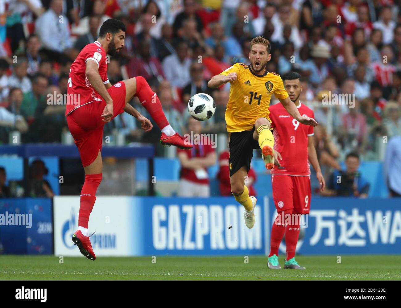 Tunisia's Yassine Meriah (left) and Belgium's Dries Mertens battle for the ball Stock Photo