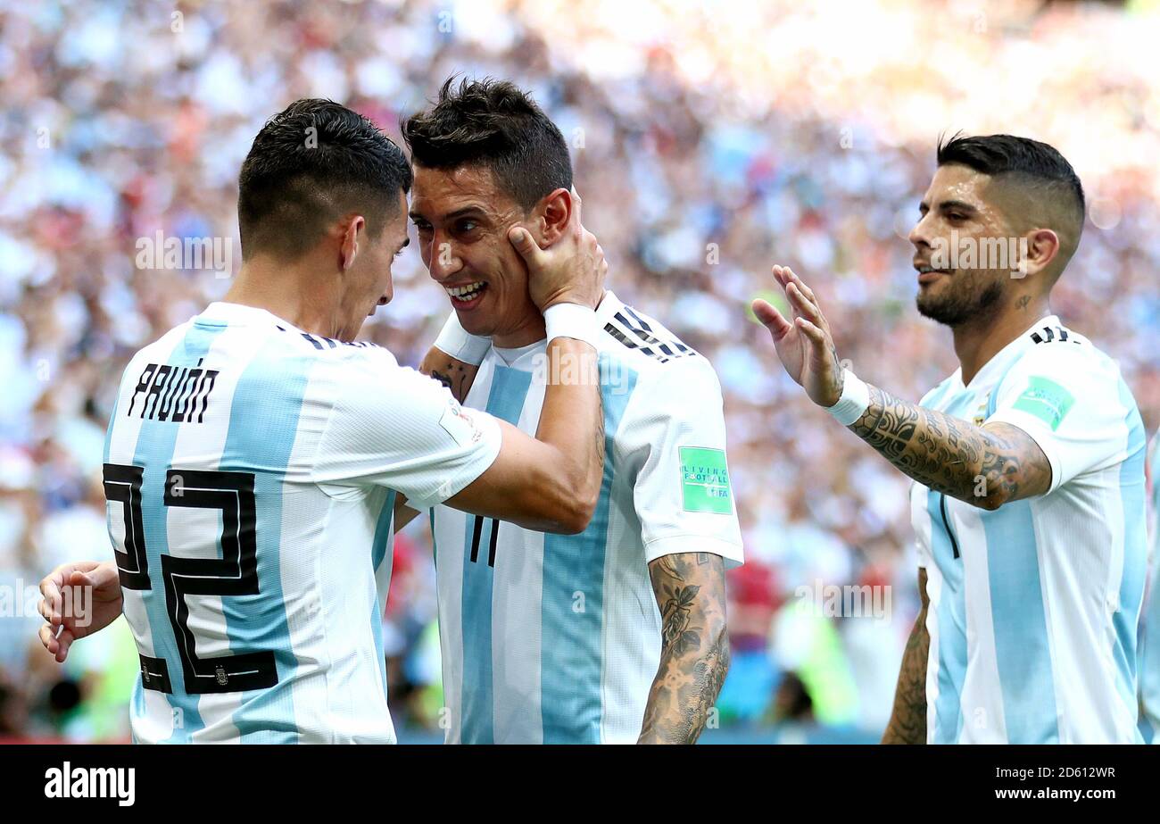 Argentina's Angel Di Maria (centre) celebrates scoring his side's first goal of the game with team-mate Argentina's Cristian Pavon (left) Stock Photo