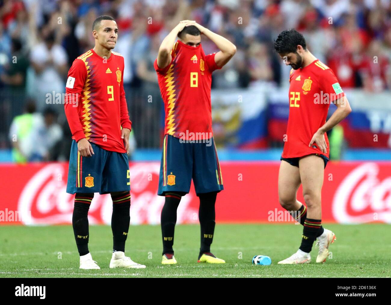 Spain's Rodrigo, Koke and Isco appear dejected after being defeated by Russia in a penalty shoot-out Stock Photo