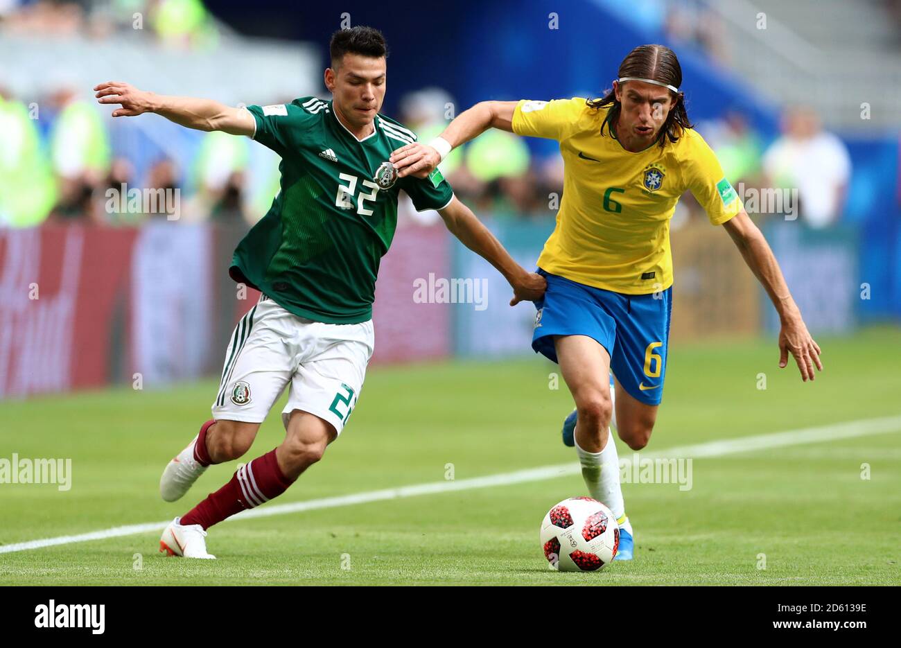 Mexico's Hugo Ayala (left) and Brazil's Filipe Luis battle for the ball Stock Photo