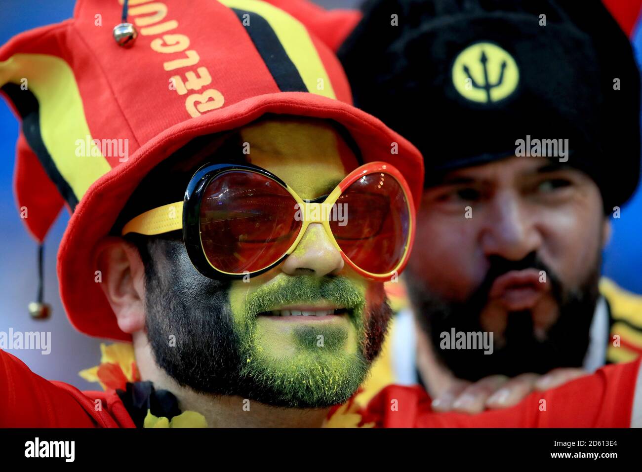 A Belgium fan shows support for his team in the stands Stock Photo
