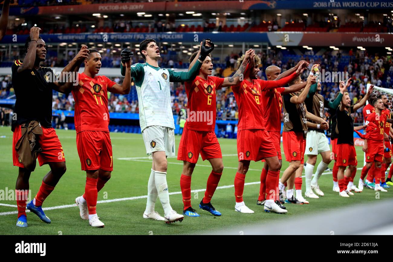 Belgium's Michy Batshuayi (left to right), Belgium's Youri Tielemans, Belgium goalkeeper Thibaut Courtois, Belgium's Axel Witsel, Belgium's Marouane Fellaini and Vincent Kompany celebrate in front of their fans after the final whistle Stock Photo