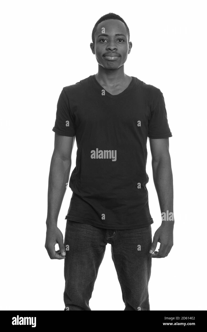 Portrait of young handsome African man looking at camera Stock Photo ...