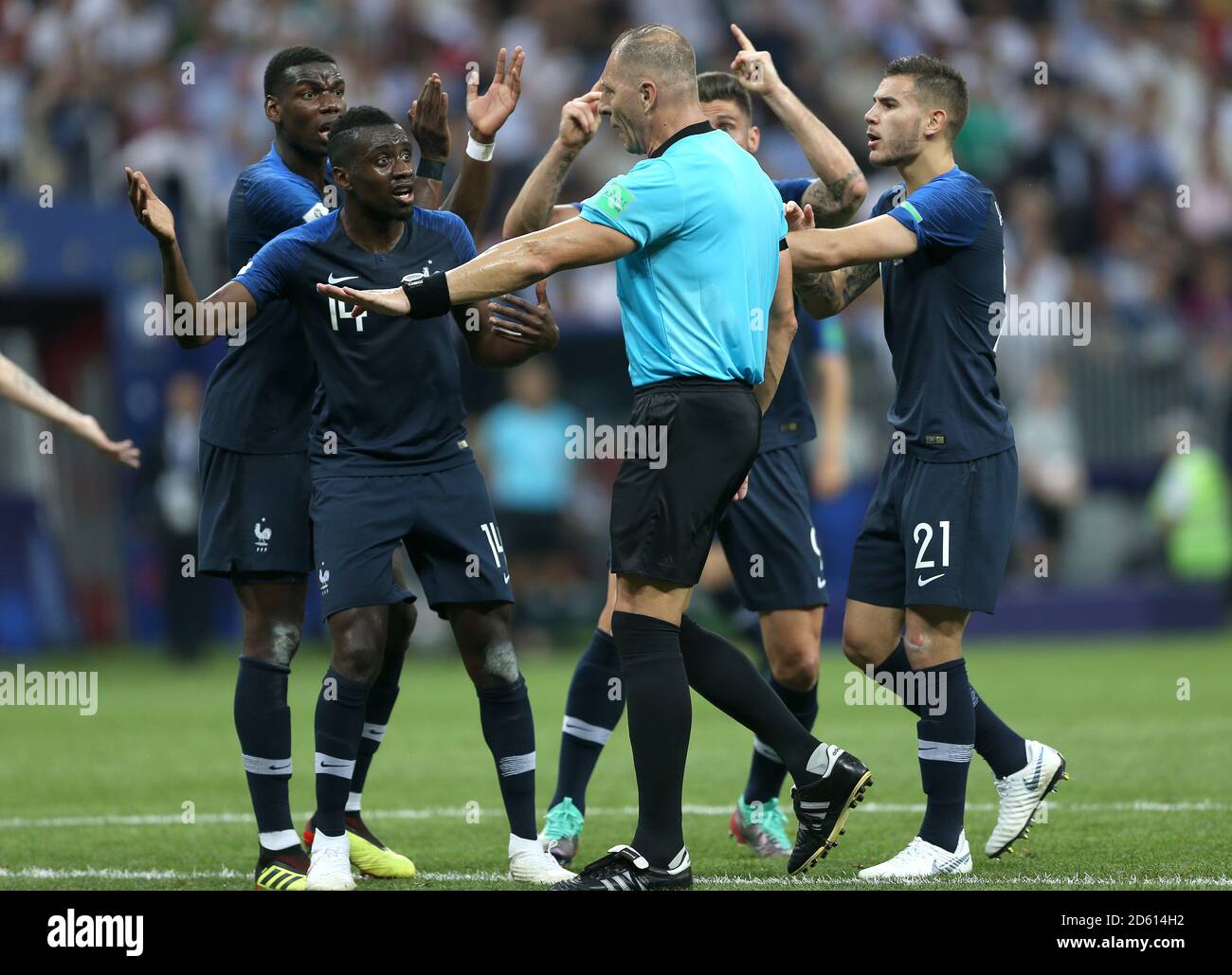 France players appeal to match referee Nestor Pitana for a penalty after a handball during the FIFA World Cup 2018 final at the Luzhniki Stadium in Moscow, 15th July 2018 Stock Photo