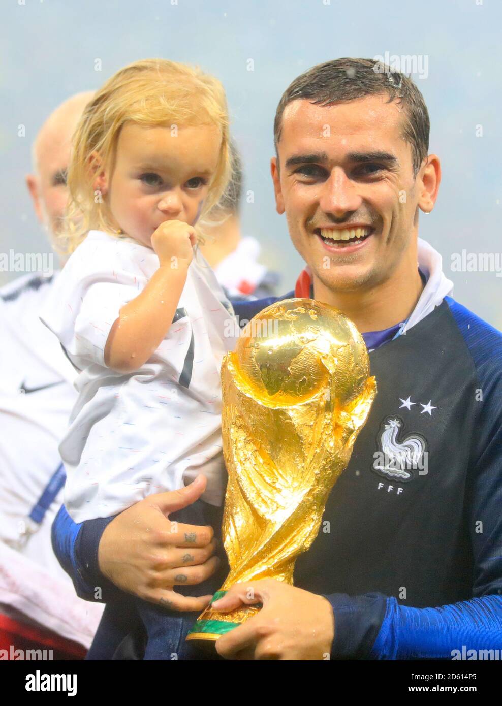 France's Antoine Griezmann celebrates with daughter Mia Griezmann and the trophy after France win the FIFA World Cup 2018 Stock Photo