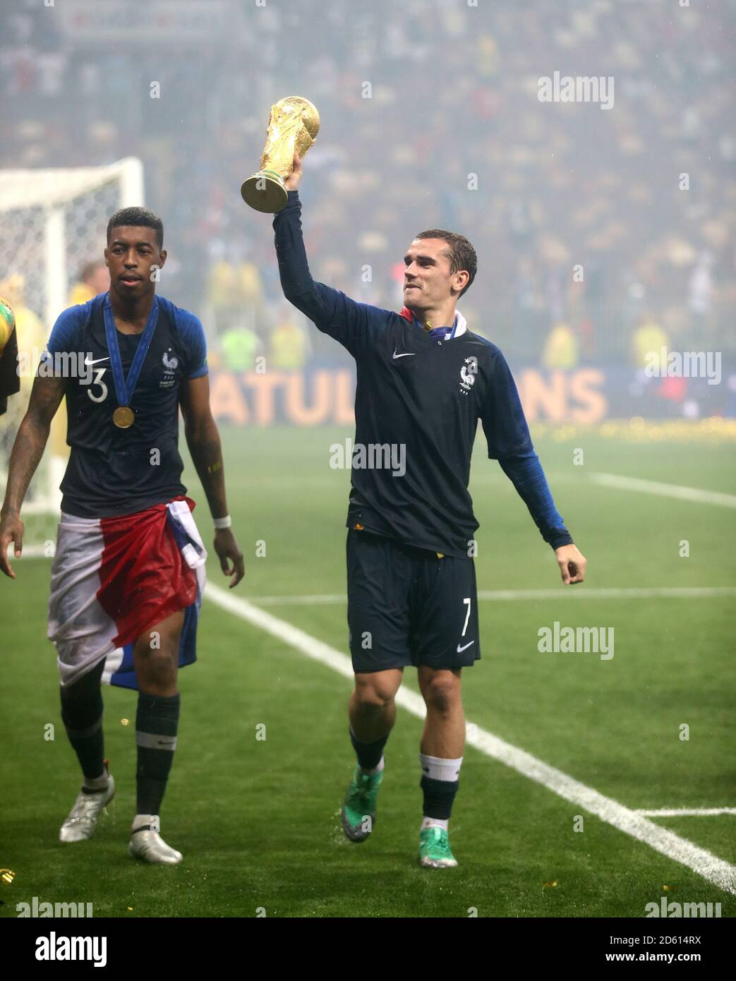 France Presnel Kimpembe (left) and Antoine Griezmann celebrate after the FIFA World Cup 2018 final at the Luzhniki Stadium in Moscow, 15th July 2018 Stock Photo