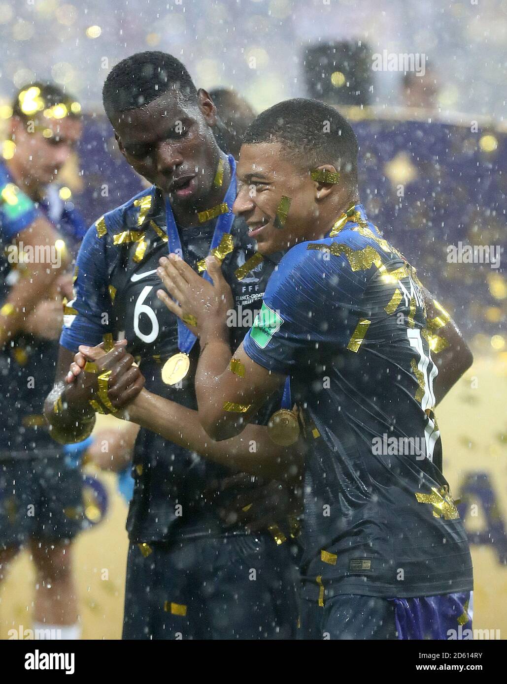 France's Paul Pogba (left) and Kylian Mbappe celebrate after the FIFA World Cup 2018 final at the Luzhniki Stadium in Moscow, 15th July 2018 Stock Photo