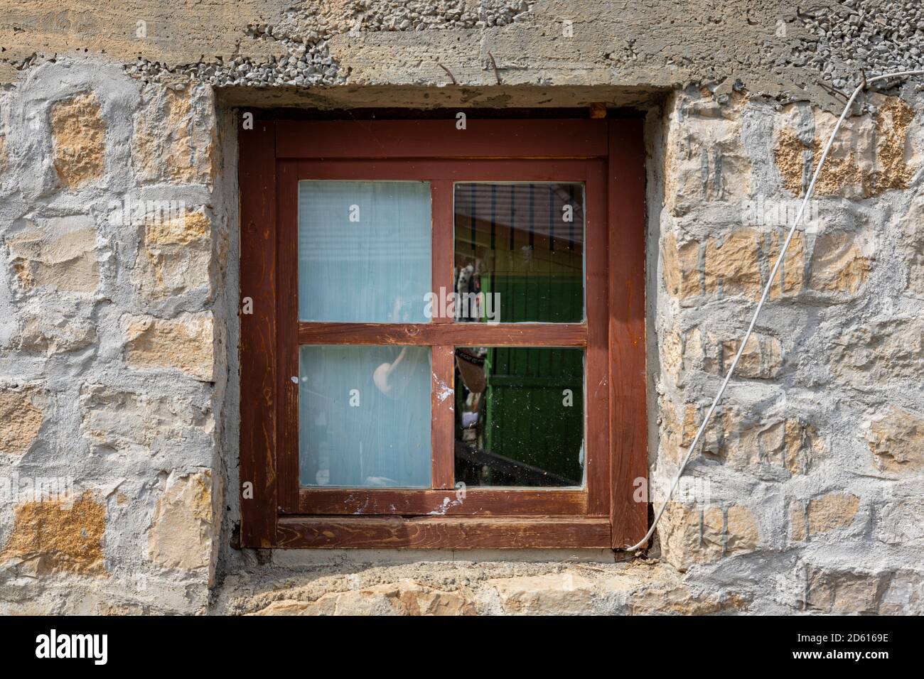 Vintage wooden window on a rustic cabine stone wall Stock Photo - Alamy