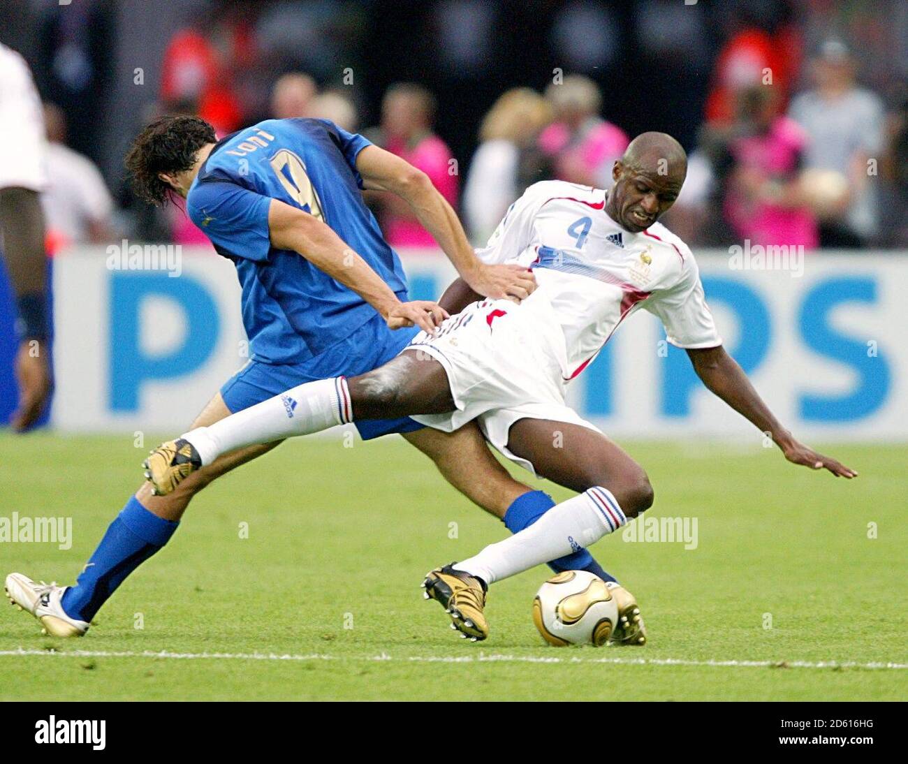 Italy's Luca Toni (l) tackles France's Patrick Vieira (r) Stock Photo