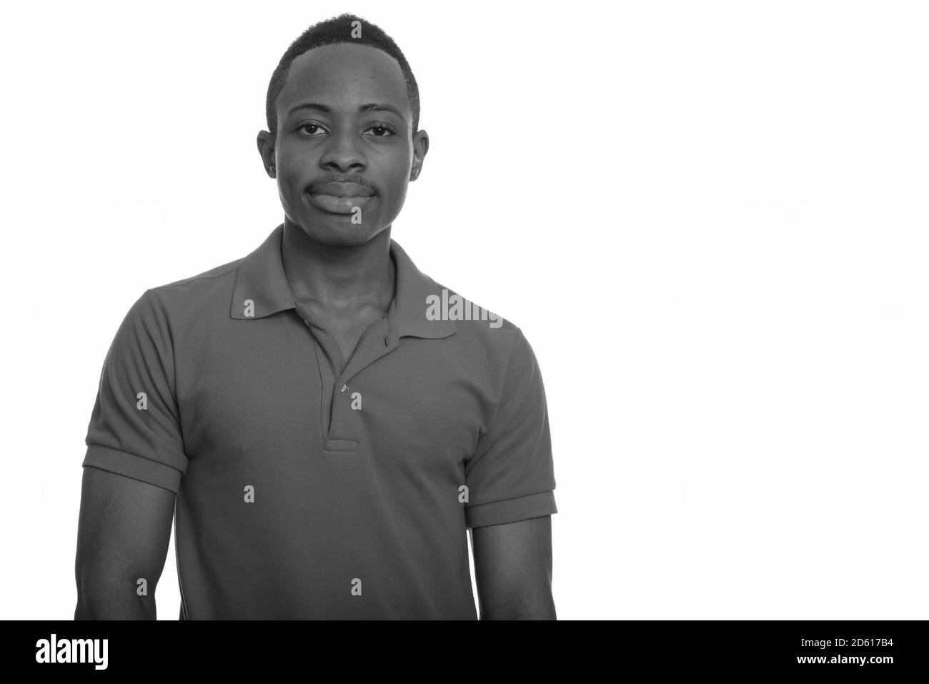 Portrait of young handsome African man looking at camera Stock Photo ...