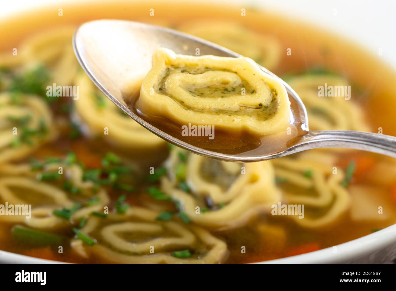 bavarian maultasche soup on wood Stock Photo