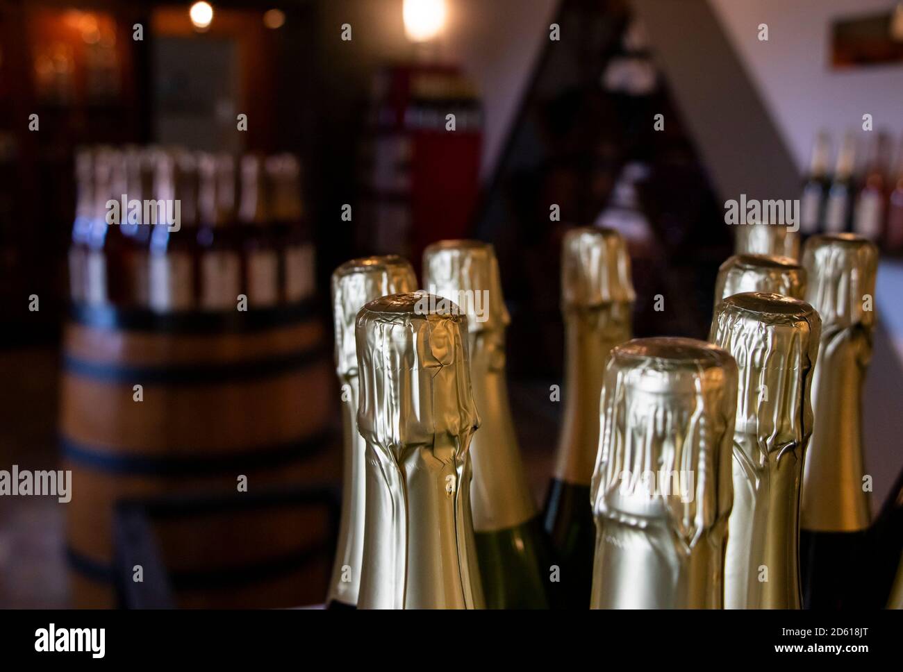 August 22, 2020 - Magog, Qc, Canada : Close up of Sparkling Wine Bottles and gold corks in a Winery Shop, Oenology, Vignoble Le Cep d'Argent Stock Photo