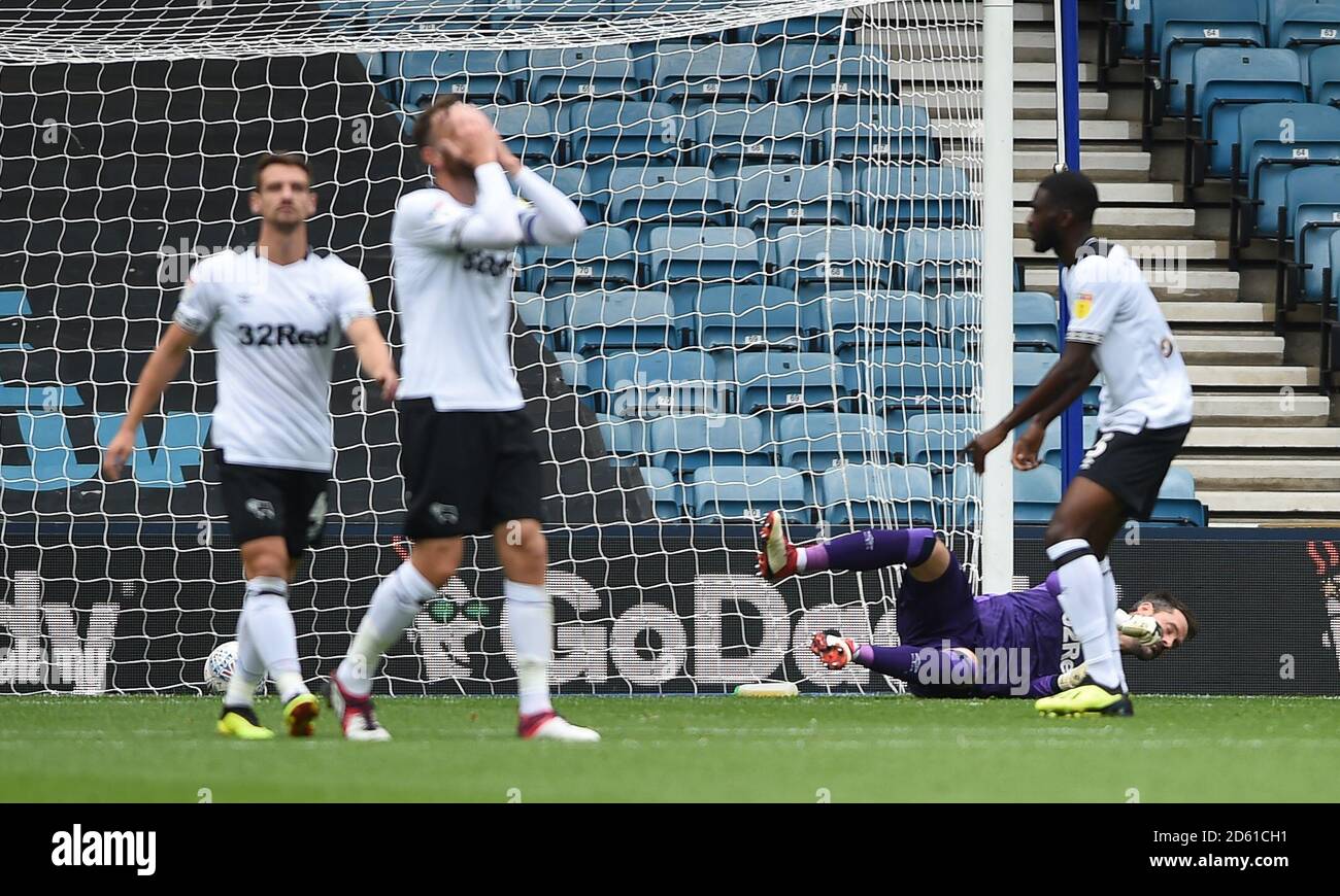 Derby County goalkeeper Scott Carson is beaten for the second goal scored by Millwall's Shaun Williams with a large deflection Stock Photo