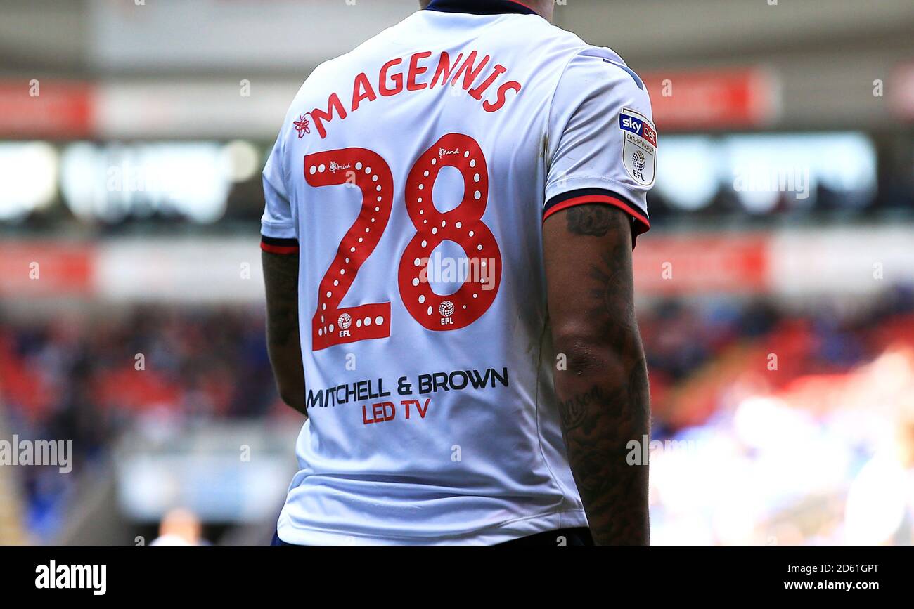 Close up of the Mind Charity branding on the back of Bolton Wanderers' Marc Wilson shirt Stock Photo
