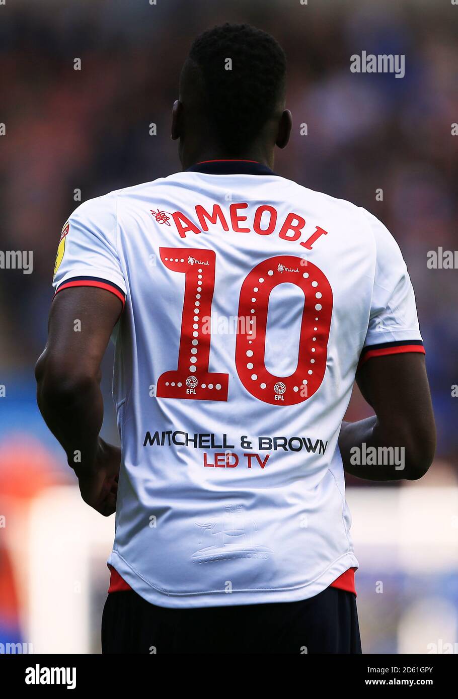 Close up of the Mind Charity branding on the back of Bolton Wanderers' Sammy Ameobi shirt Stock Photo