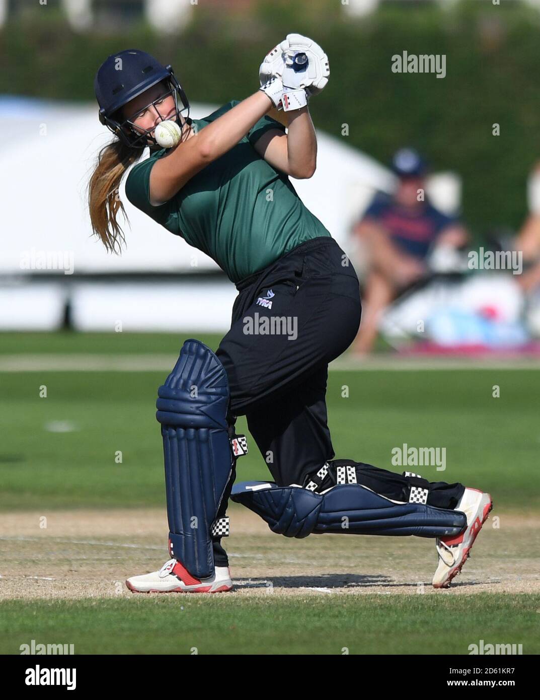 Team Sciver's Alex Griffiths bats during the cricket competition at the