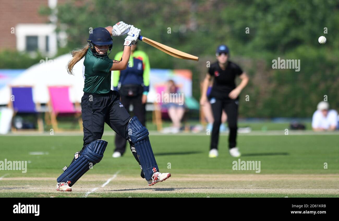 Team Sciver's Alex Griffiths bats during the cricket competition at the
