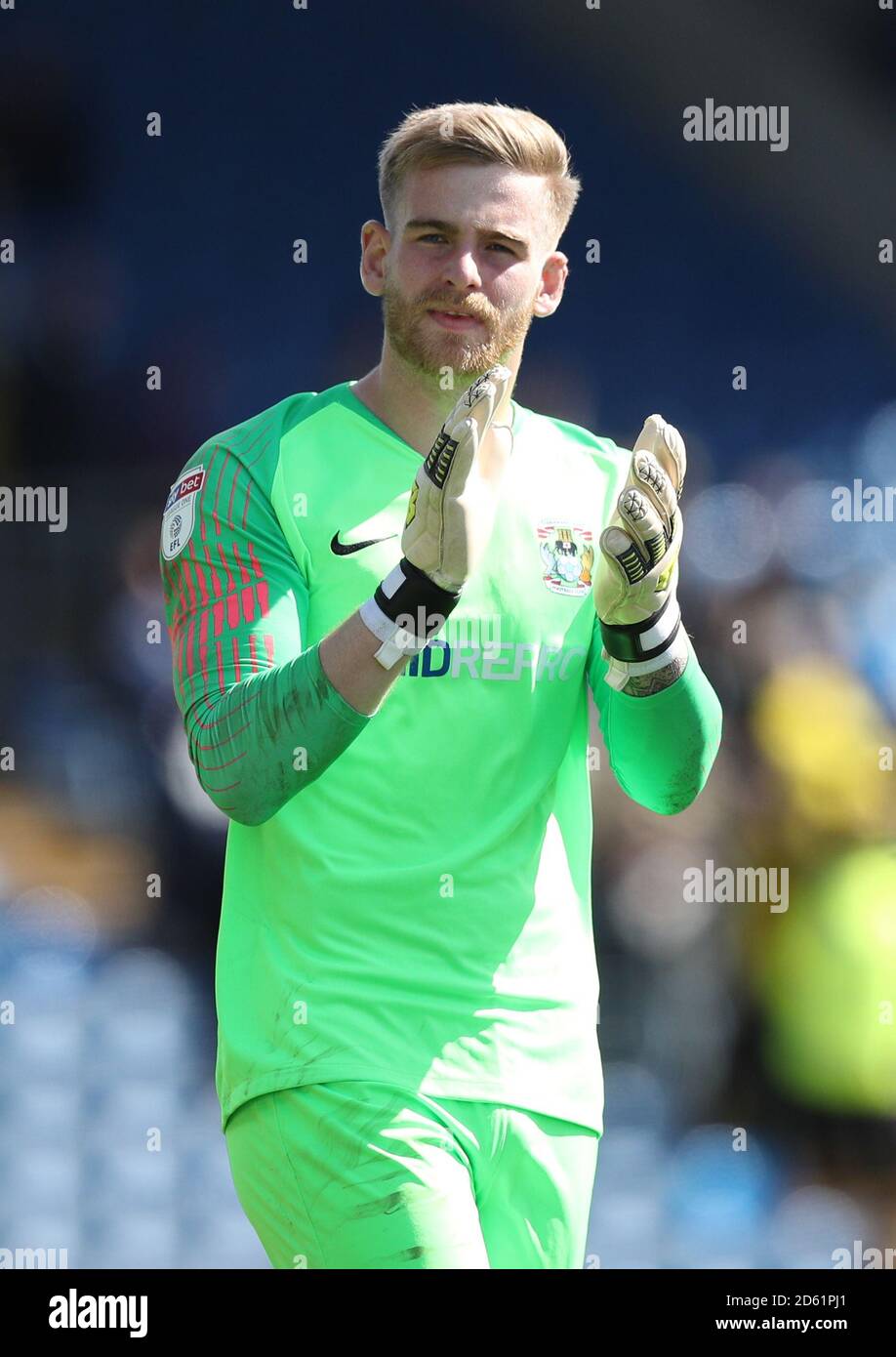 Coventry City goalkeeper Lee Burge applauds the away fans after the
