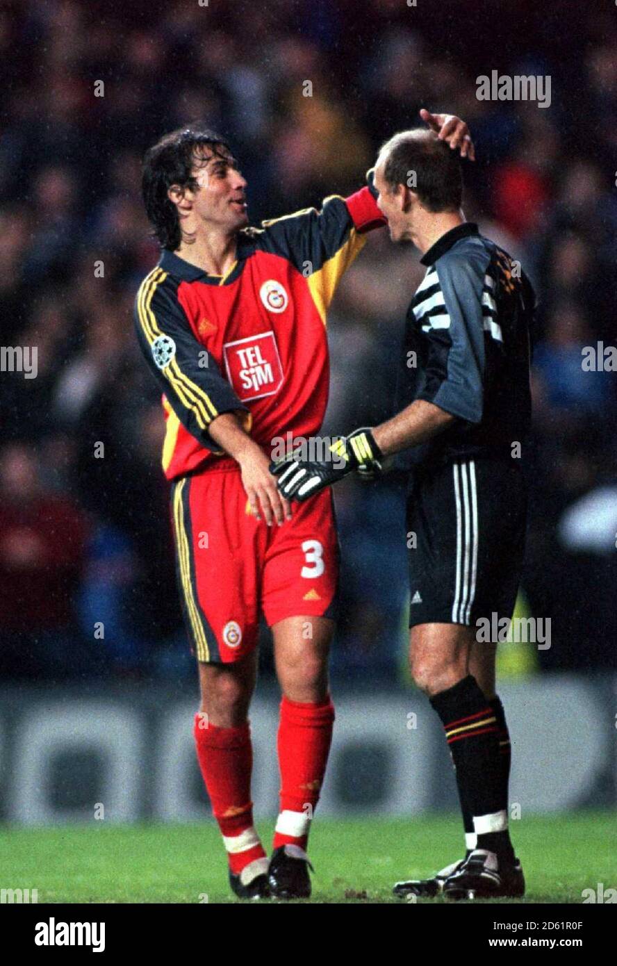 Galatasaray's goalkeeper Claudio Taffarel (r) is congratulated by teammate Bulent Korkmaz (l) at the final whistle Stock Photo
