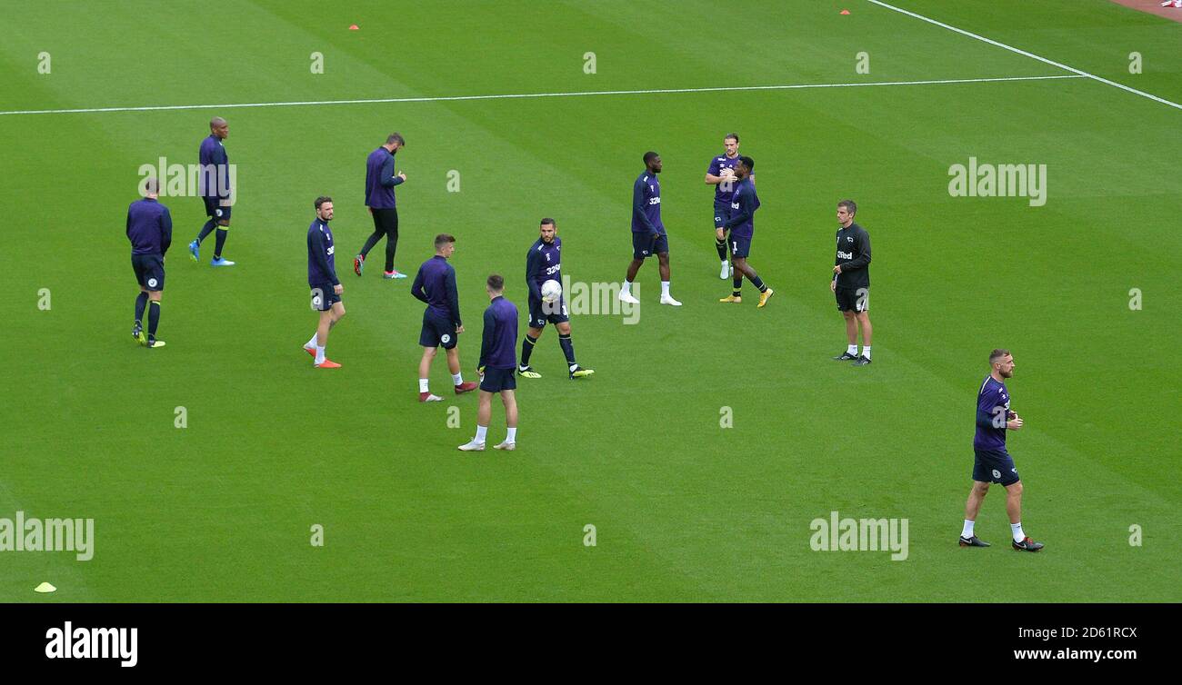 Derby County players warm up before the game Stock Photo