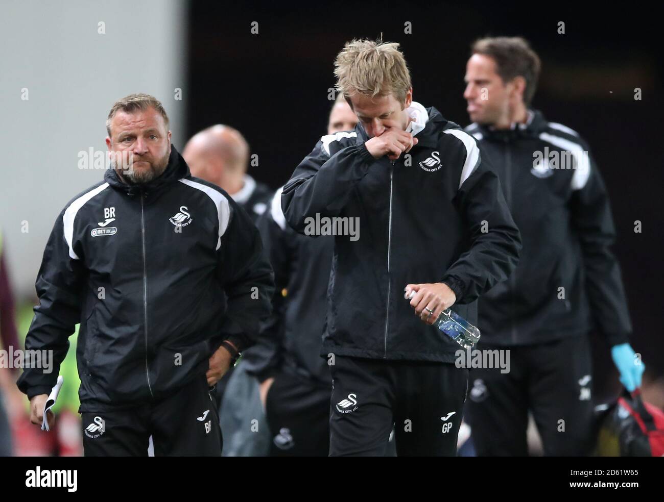 Swansea City manager Graham Potter centre and assistant manager