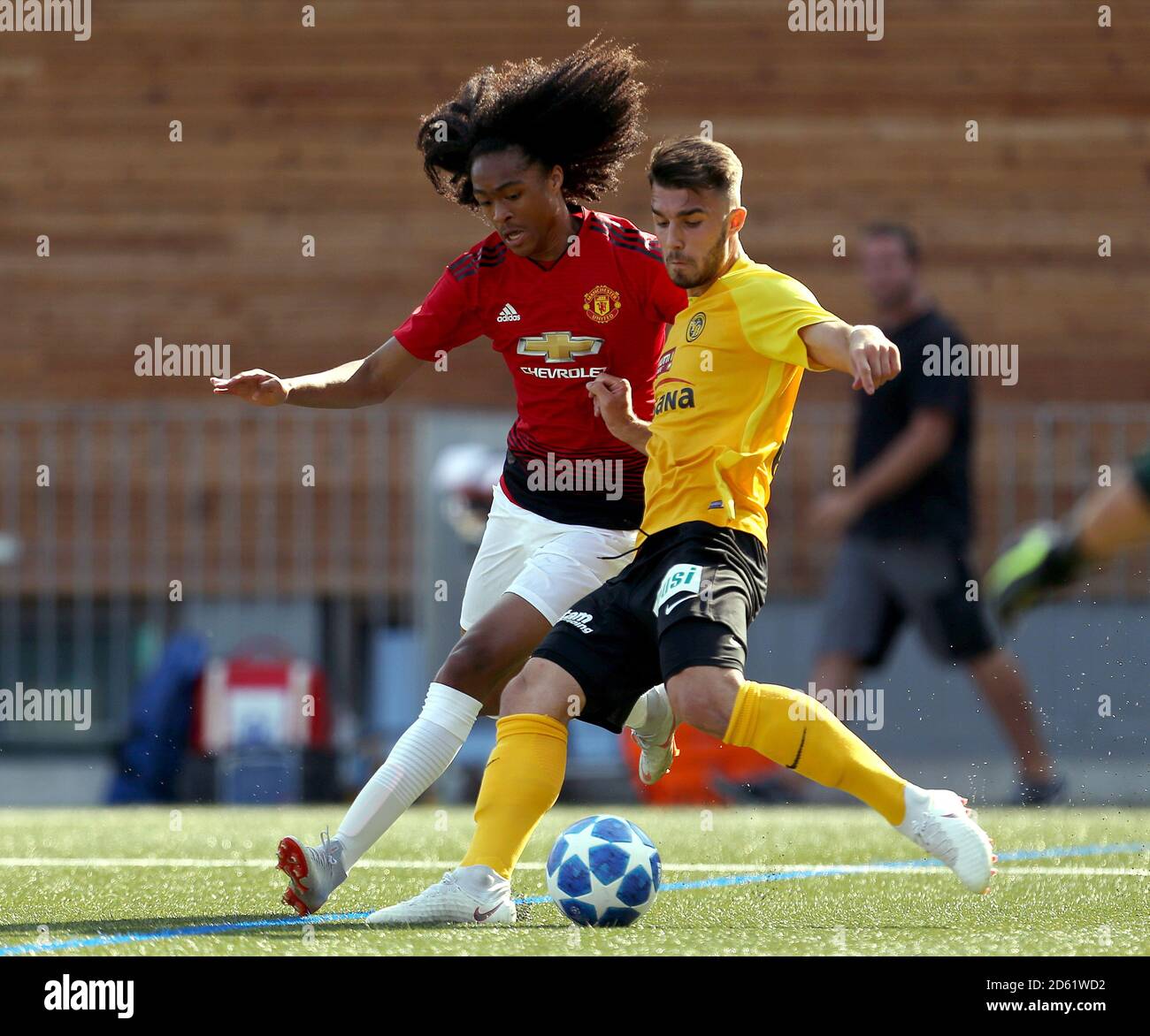Manchester United's Tahith Chong and BSC Young Boys Kreshnik Hajrizi in action Stock Photo