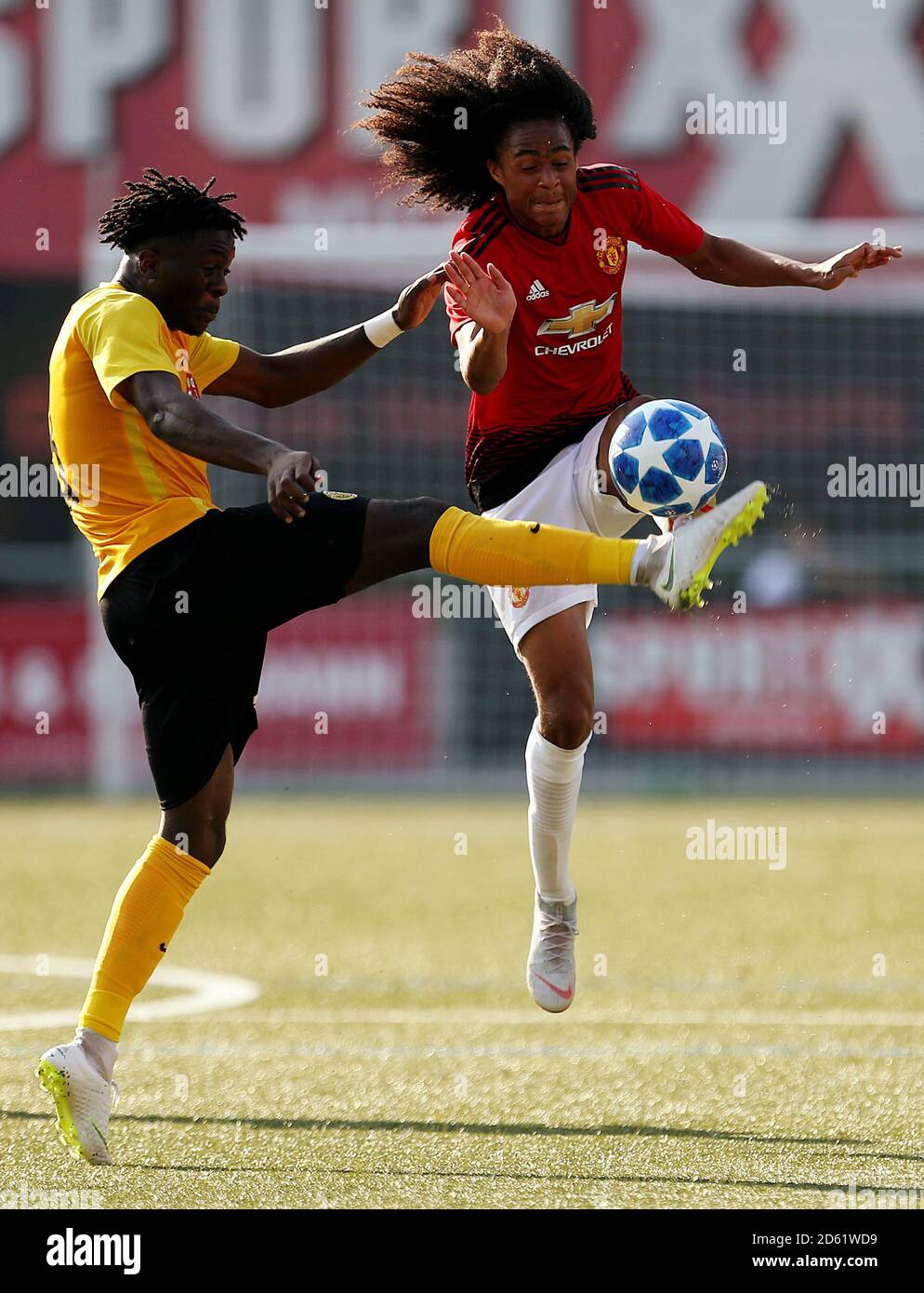 Manchester United's Tahith Chong and BSC Young Boys Steve Perrault Tokam Membou in action Stock Photo